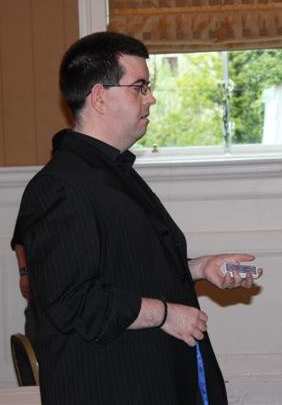 Magician Peter McLanachan, The Cardman, performing card magic